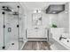 Modern bathroom with marble accents, a large shower, and a free-standing tub at 1010 Emerald Creek Dr, Valrico, FL 33596