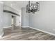 Bright dining room with hardwood floors and chandelier at 1010 Emerald Creek Dr, Valrico, FL 33596