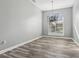 Bright dining room featuring hardwood floors and a chandelier at 1010 Emerald Creek Dr, Valrico, FL 33596