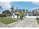 House exterior with driveway and white fence at 1010 Emerald Creek Dr, Valrico, FL 33596