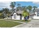 House exterior with driveway and white fence at 1010 Emerald Creek Dr, Valrico, FL 33596