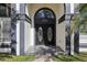 Inviting house entrance with double doors and stone accents at 1010 Emerald Creek Dr, Valrico, FL 33596