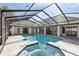 Large screened-in pool with spa at 1010 Emerald Creek Dr, Valrico, FL 33596