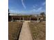 Beach access path with benches overlooking the ocean at 1019 Mandalay Ave, Clearwater Beach, FL 33767