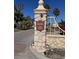 Community entrance with stone pillars and signage at 1019 Mandalay Ave, Clearwater Beach, FL 33767