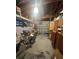 Garage with storage shelves, bicycle, and various items at 1019 Mandalay Ave, Clearwater Beach, FL 33767