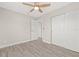 Spacious bedroom with ceiling fan and double door closets at 11395 83Rd Ave, Seminole, FL 33772