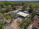 Expansive aerial view showcasing the property's layout and surrounding landscape at 1215 E Holland Ave, Tampa, FL 33612