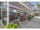 Spacious outdoor living area under a covered patio at 1215 E Holland Ave, Tampa, FL 33612