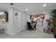 The dining area features hardwood floors, recessed lighting, and a view of the kitchen at 1215 E Holland Ave, Tampa, FL 33612