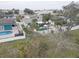 Aerial view of house with pool and backyard at 12391 70Th St, Largo, FL 33773