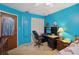 Bedroom featuring a built-in desk and chair, plus a large closet at 12433 Shadow Ridge Blvd, Hudson, FL 34669