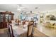 Formal dining room with a large wooden table and six chairs at 12433 Shadow Ridge Blvd, Hudson, FL 34669