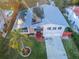 Top-down view of house showcasing solar panels and pool at 14311 83Rd Pl, Seminole, FL 33776