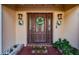 Inviting front entrance with decorative wreath and welcoming mat at 14311 83Rd Pl, Seminole, FL 33776