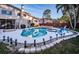 Expansive pool and spa with lighting and landscaping at 14311 83Rd Pl, Seminole, FL 33776