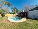 Private backyard with a refreshing pool at 15716 Country Lake Dr, Tampa, FL 33624