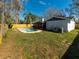 Spacious backyard with a kidney-shaped pool at 15716 Country Lake Dr, Tampa, FL 33624