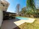 Relaxing backyard with a large pool and patio at 15716 Country Lake Dr, Tampa, FL 33624