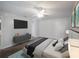 Well-lit bedroom with modern decor and ceiling fan at 15716 Country Lake Dr, Tampa, FL 33624