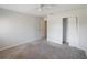 Empty bedroom featuring neutral walls and carpet at 15716 Country Lake Dr, Tampa, FL 33624