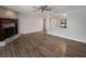 Living room featuring a fireplace and hardwood floors at 15716 Country Lake Dr, Tampa, FL 33624