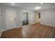 Bright and airy living room with hardwood floors and a neutral color palette at 15716 Country Lake Dr, Tampa, FL 33624