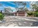 Two-car garage with extra storage space at 15927 Ternglade Dr, Lithia, FL 33547