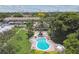 Aerial view of community pool and surrounding landscape at 1601 43Rd N St # 133, St Petersburg, FL 33713