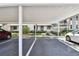 Covered carport parking with access to building entrance at 1601 43Rd N St # 133, St Petersburg, FL 33713