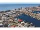 Aerial view of a waterfront home near the beach at 17020 Dolphin Dr, North Redington Beach, FL 33708