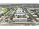 Aerial view of condo community near golf course and waterfront at 1750 Belleair Forest Dr # A15, Belleair, FL 33756