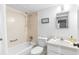 Clean bathroom with a shower/tub combo and updated vanity at 1750 Belleair Forest Dr # A15, Belleair, FL 33756