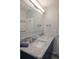 Updated bathroom with a large vanity and modern fixtures at 1900 41St N St, St Petersburg, FL 33713