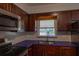 Modern kitchen with stainless steel appliances and blue quartz countertops at 1900 41St N St, St Petersburg, FL 33713