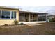 Spacious screened porch with tile flooring and ceiling fan at 1900 41St N St, St Petersburg, FL 33713