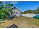 Spacious backyard featuring a large lawn and white fence at 2070 28Th St, Sarasota, FL 34234