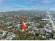 Aerial view of a house nestled in a residential neighborhood near the city skyline at 216 23Rd N Ave, St Petersburg, FL 33704