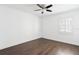 Spacious bedroom with hardwood floors and window with shutters at 216 23Rd N Ave, St Petersburg, FL 33704