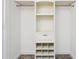 Bright white closet with shelves, drawers, and hanging rod at 216 23Rd N Ave, St Petersburg, FL 33704