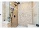 Large walk-in shower with tile surround and built-in seat at 216 23Rd N Ave, St Petersburg, FL 33704