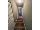 Hallway features neutral paint and updated wood-look flooring at 22065 Malone Ave, Port Charlotte, FL 33952