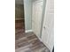 Hallway featuring modern floors and fresh paint at 22065 Malone Ave, Port Charlotte, FL 33952