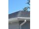 Close-up of a roof and gutter showing quality construction with a durable gutter system at 22065 Malone Ave, Port Charlotte, FL 33952