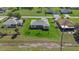 Aerial view of property, showcasing home and surrounding landscape at 25434 Alicante Dr, Punta Gorda, FL 33955