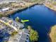 Beautiful aerial view of condominiums, lake and community at 2648 Sabal Springs Dr # 2, Clearwater, FL 33761