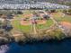 Aerial view of well-maintained baseball fields located in a Gathering-friendly community with water access at 2648 Sabal Springs Dr # 2, Clearwater, FL 33761