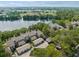 Aerial view of condo community by a lake at 2824 Countryside Blvd # 326, Clearwater, FL 33761