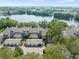 Aerial view of condo community near a lake at 2824 Countryside Blvd # 326, Clearwater, FL 33761