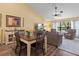 Bright dining area with wood table and seating for six at 2824 Countryside Blvd # 326, Clearwater, FL 33761